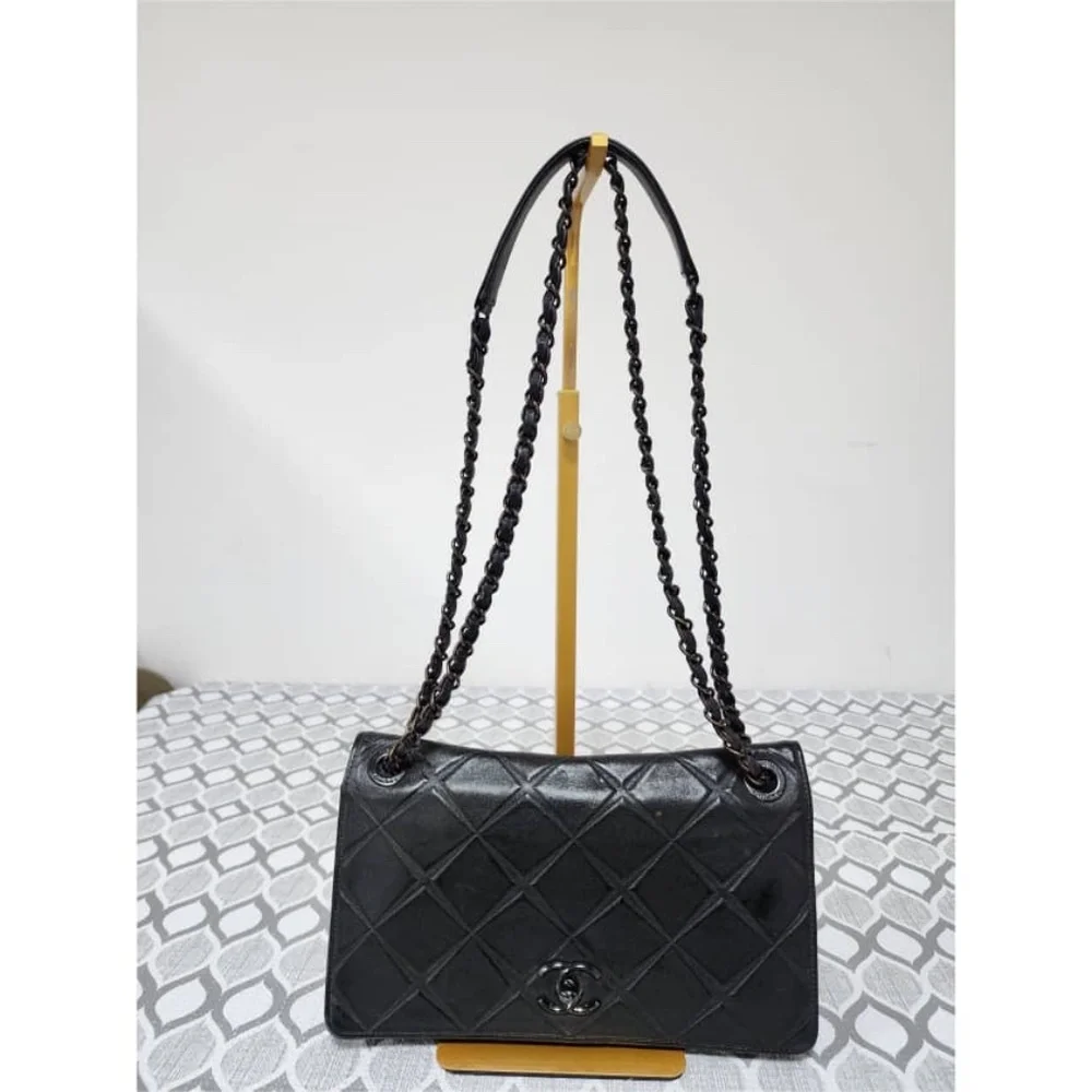 Authentic CHANEL Quilted Lambskin Leather Orient Express Flap Bag Black